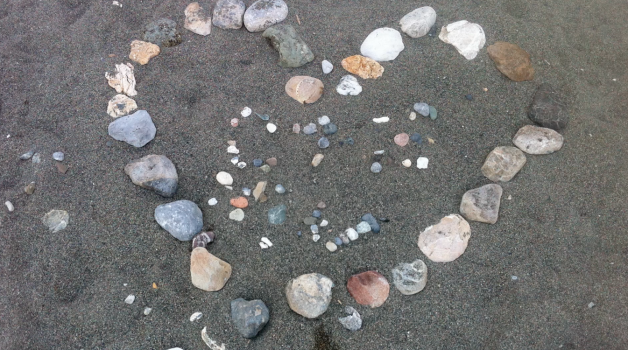 Rocks forming a heart shape on a beach
