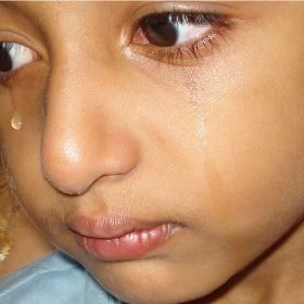 Natural urges and emotions: boy with tears on his face